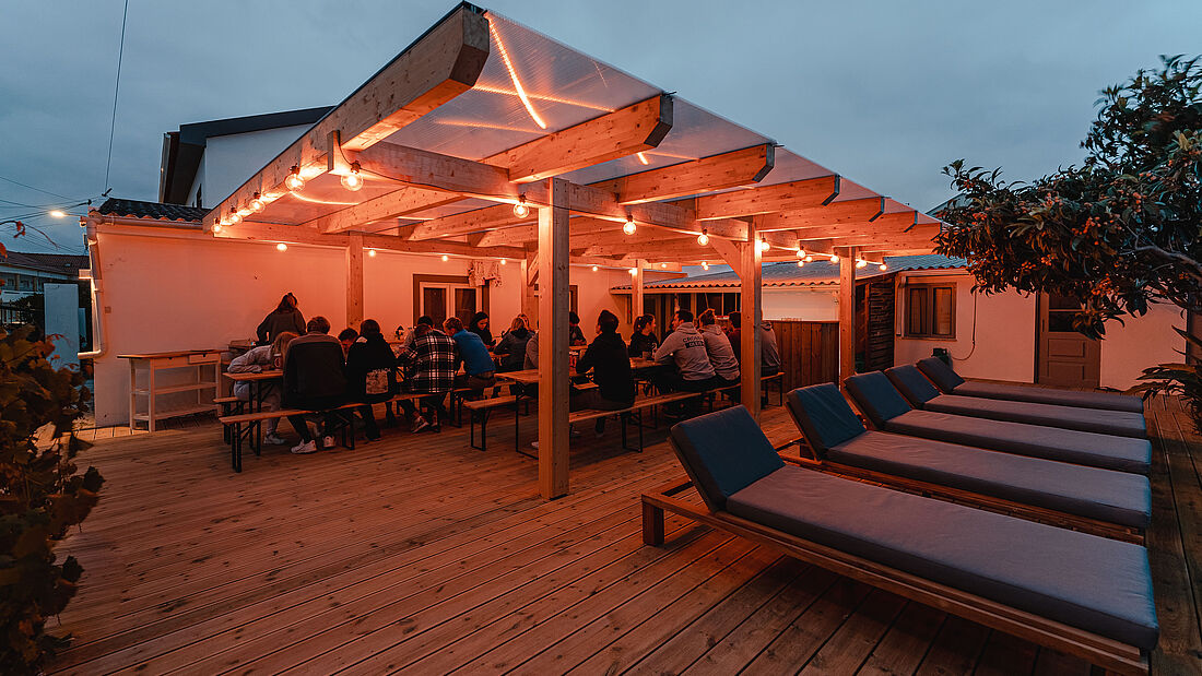 Sit together, laugh, and make new friendships Community in our Pure Surf Camp Peniche