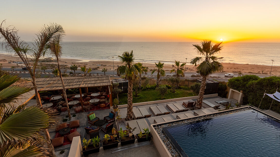 Cocktails, pools and sunsets simply go together