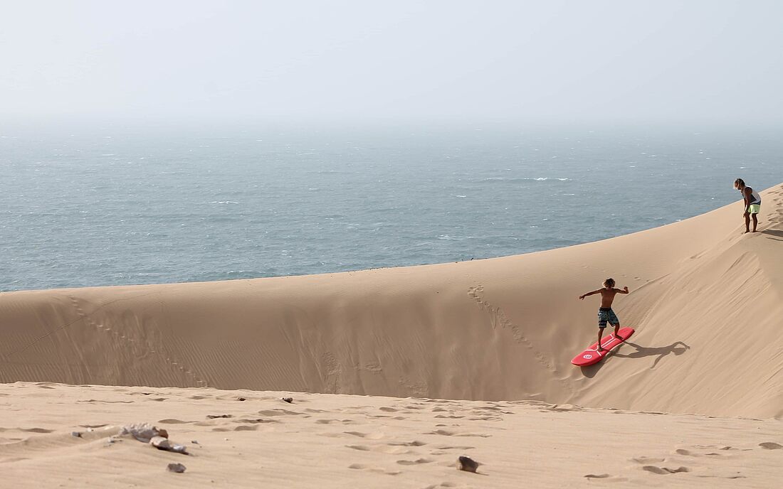 surfing sand Pure surf camp activity