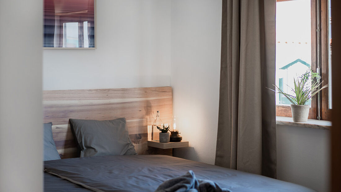 the single beds can also get pushed together pure surf camp peniche double room accommodation