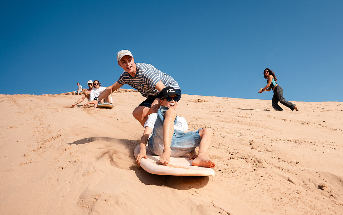 Our weekly dune surfing brings people together and creates real friendships.
